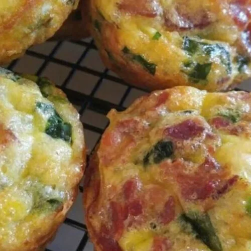 Low-carb egg and bacon cups, close up, golden and set