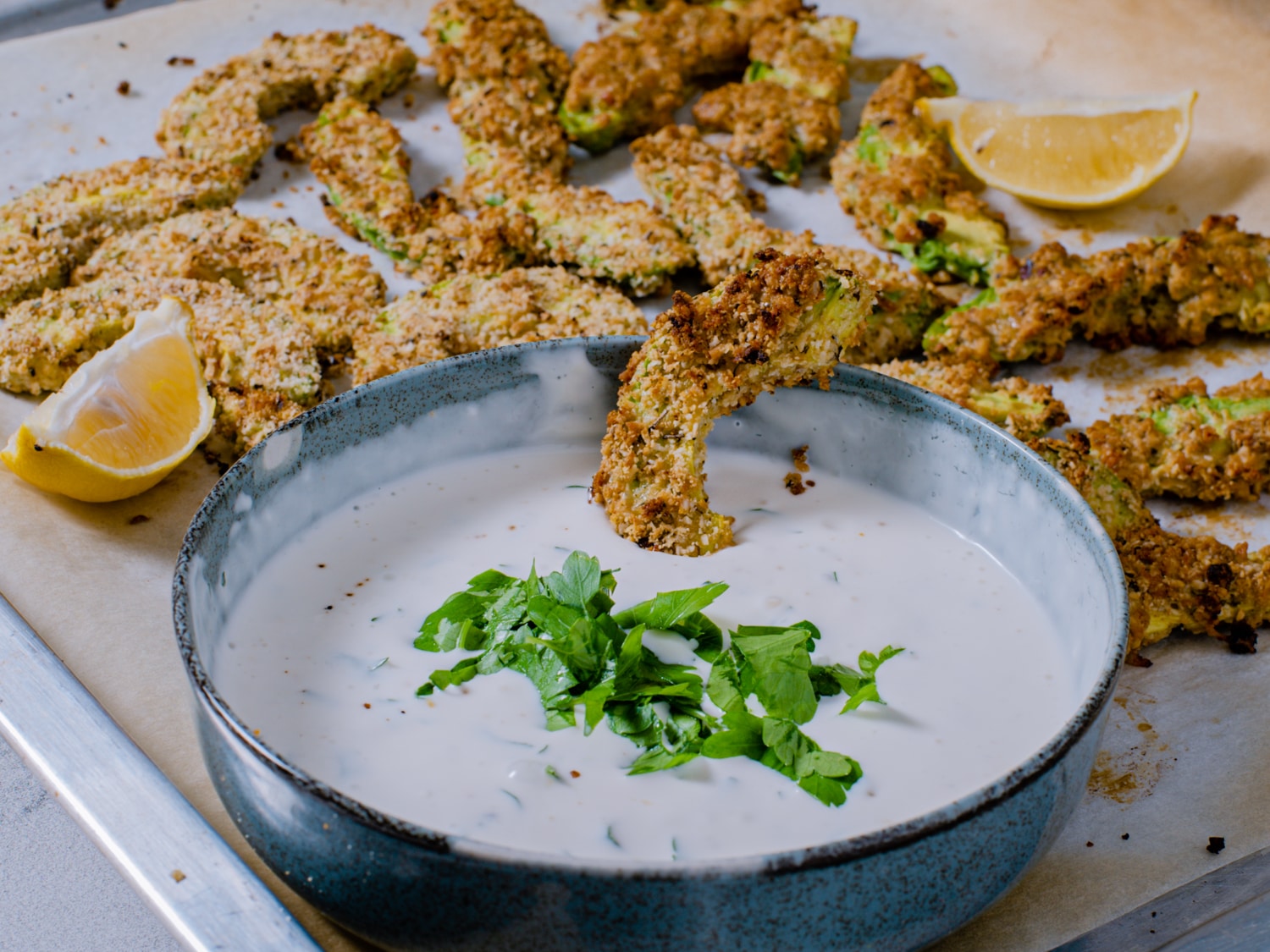 Garlic Parmesan Baked Avocado Fries with Lemon Dip ready to serve